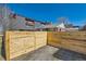 Sturdy wooden fence encloses the backyard, offering privacy and security at 1540 Zenobia St, Denver, CO 80204