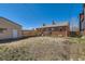 Expansive backyard featuring a detached garage and plenty of space at 1540 Zenobia St, Denver, CO 80204