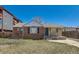 Charming single-story brick home with a well-maintained front yard and covered porch at 1540 Zenobia St, Denver, CO 80204