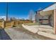 Large front yard with concrete walkway to charming covered front porch at 1540 Zenobia St, Denver, CO 80204