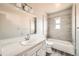 Clean bathroom with a bathtub, toilet and sink vanity at 1230 Peoria St, Aurora, CO 80011