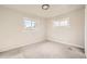 Bright bedroom featuring neutral walls and carpet at 1230 Peoria St, Aurora, CO 80011
