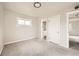 Spacious bedroom with access to a full bathroom at 1230 Peoria St, Aurora, CO 80011
