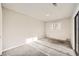 Simple bedroom with carpet flooring, neutral walls and sliding glass door at 1230 Peoria St, Aurora, CO 80011