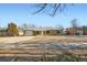 Ranch style home with attached garage at 1230 Peoria St, Aurora, CO 80011
