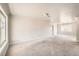 Spacious living area with large windows and neutral color palette at 1230 Peoria St, Aurora, CO 80011