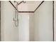 Small shower stall with tiled walls at 1230 Peoria St, Aurora, CO 80011