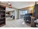 Home office with views of living room and access to balcony at 14000 E Linvale Pl # 511, Aurora, CO 80014