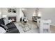 Stylish living room featuring a fireplace, contemporary furniture, and chic accents at 1888 Oakcrest Cir, Castle Rock, CO 80104