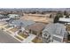 A bird's eye view shows the property nestled among well-maintained homes with mature trees at 5331 Routt Ct, Arvada, CO 80002