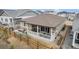 Aerial view of home showing a covered patio and wooden fence surrounding the property at 5331 Routt Ct, Arvada, CO 80002