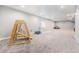 Large, finished basement area featuring carpet and play area perfect for entertaining or relaxing at 5331 Routt Ct, Arvada, CO 80002