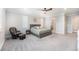 Spacious main bedroom with an ensuite bathroom and a seating area at 5331 Routt Ct, Arvada, CO 80002