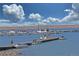 Beautiful lakeside marina view with boats docked and clear blue skies above at 12925 Sierra Cir, Parker, CO 80138