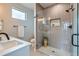 Modern bathroom with a glass-enclosed shower and sleek fixtures at 15 S Gray St, Lakewood, CO 80226