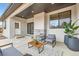 Stylish covered patio featuring elegant outdoor seating and modern design elements at 15 S Gray St, Lakewood, CO 80226