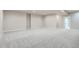Spacious carpeted room with ample natural light and a view of the outdoors at 15 S Gray St, Lakewood, CO 80226
