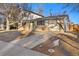 Two-story house with driveway and front yard at 7452 Otis St, Arvada, CO 80003