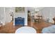 The open dining area features hardwood floors, a chandelier, and access to the kitchen and living area at 31219 Florence Rd, Conifer, CO 80433