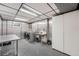 Efficient laundry room with stainless steel appliances and ample storage at 4090 S Tamarac Dr, Denver, CO 80237