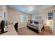 Inviting bedroom with a beach theme, featuring a desk, and relaxing decor at 6503 Big Horn Trl, Littleton, CO 80125
