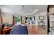 Spacious living room featuring recessed lighting, media center and sliding glass doors to the backyard at 6503 Big Horn Trl, Littleton, CO 80125