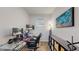 Bright office space with sleek glass desk, dual monitors, and stylish decor at 6503 Big Horn Trl, Littleton, CO 80125
