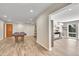 Finished basement featuring a pool table and a comfortable entertainment area with a modern fireplace at 27100 Molly Dr, Conifer, CO 80433