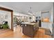 Kitchen features modern appliances, a center island and an adjacent breakfast nook at 27100 Molly Dr, Conifer, CO 80433