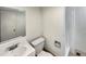 Clean bathroom with a white vanity, toilet, and shower/tub combination at 6189 Pontiac St, Commerce City, CO 80022