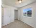 Bedroom with a built-in closet for maximum storage and a view to the street at 6189 Pontiac St, Commerce City, CO 80022
