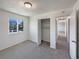 Bedroom has ample closet space and a window with a view at 6189 Pontiac St, Commerce City, CO 80022