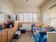 Bedroom with neutral walls, window and carpet at 319 Mountain View Ave, Fort Lupton, CO 80621