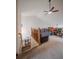 Bonus room with carpet, neutral walls and a view of the stairs at 319 Mountain View Ave, Fort Lupton, CO 80621
