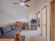 Bonus room with carpet, neutral walls and a view of the hallway at 319 Mountain View Ave, Fort Lupton, CO 80621
