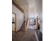 Grand foyer with staircase, high ceilings, and modern lighting at 319 Mountain View Ave, Fort Lupton, CO 80621