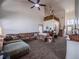 Spacious living room featuring high ceilings, neutral carpet, and comfortable seating at 319 Mountain View Ave, Fort Lupton, CO 80621