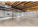 Unfinished basement with high ceilings and ample space at 14240 Ivanhoe St, Thornton, CO 80602
