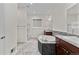 Elegant bathroom with double sinks, soaking tub, and shower at 14240 Ivanhoe St, Thornton, CO 80602