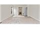 Bright bedroom with carpet and access to the bathroom at 14240 Ivanhoe St, Thornton, CO 80602