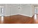 Bright dining room with hardwood floors and a chandelier at 14240 Ivanhoe St, Thornton, CO 80602