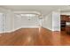 Formal dining room with hardwood floors and an elegant chandelier at 14240 Ivanhoe St, Thornton, CO 80602