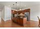 Kitchen with stainless steel appliances and an island at 14240 Ivanhoe St, Thornton, CO 80602