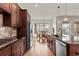 Kitchen with granite countertops and stainless steel appliances at 14240 Ivanhoe St, Thornton, CO 80602