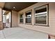 Covered patio with concrete flooring and windows at 14240 Ivanhoe St, Thornton, CO 80602