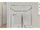 Clean shower with glass enclosure and tiled walls at 14240 Ivanhoe St, Thornton, CO 80602