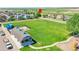 Aerial view of house in relation to nearby park at 2791 Quarterland St, Strasburg, CO 80136