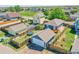 Aerial view of the home showcasing the fenced backyard and neighborhood at 2791 Quarterland St, Strasburg, CO 80136