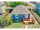Aerial shot of the backyard with wood deck and fenced yard at 2791 Quarterland St, Strasburg, CO 80136