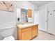 Bathroom featuring a double sink vanity and shower/tub combination at 2791 Quarterland St, Strasburg, CO 80136